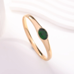 Emerald Accent Gold Bangle Bracelet