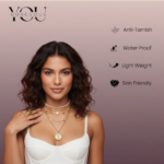 Anti-tarnish 18K gold plated midnight black clover motif bracelet for women featuring gold-rimmed flower charms on a link chain by YouGorgeous.