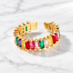 Yougorgeous 18K gold rainbow baguette adjustable ring with multicolour crystals on white background