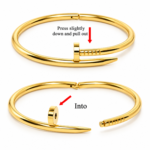 Yougorgeous 18K gold plain nail bangle with curved silhouette on white background