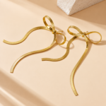 Yougorgeous 18K gold plated snake chain bow drop earrings on white background