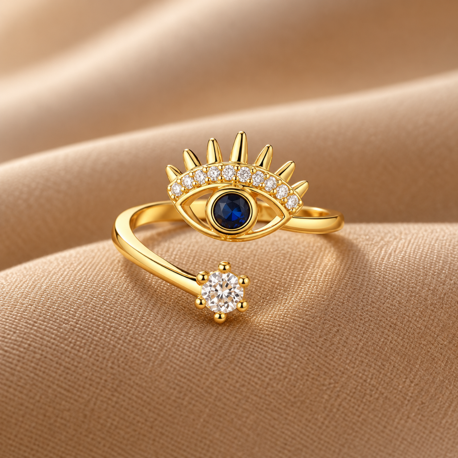 Yougorgeous 18K gold plated evil eye sunburst adjustable bypass ring on white background Yougorgeous 18K gold plated evil eye sunburst adjustable bypass ring on white background