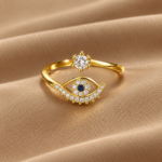 Yougorgeous 18K gold plated evil eye beaded lash adjustable bypass ring on white background