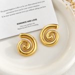 Yougorgeous 18K gold plated sculptural spiral stud earrings on white background