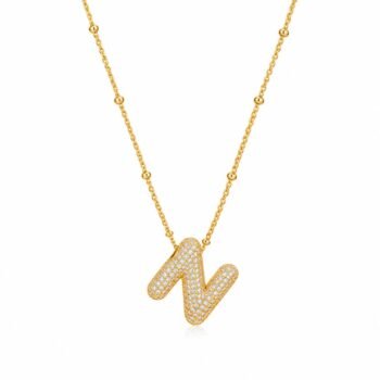 Yougorgeous 18K gold bubble letter N necklace with crystal pavé on white background
