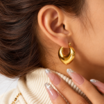 Yougorgeous 18K gold plated chunky heart hoop earrings on white background