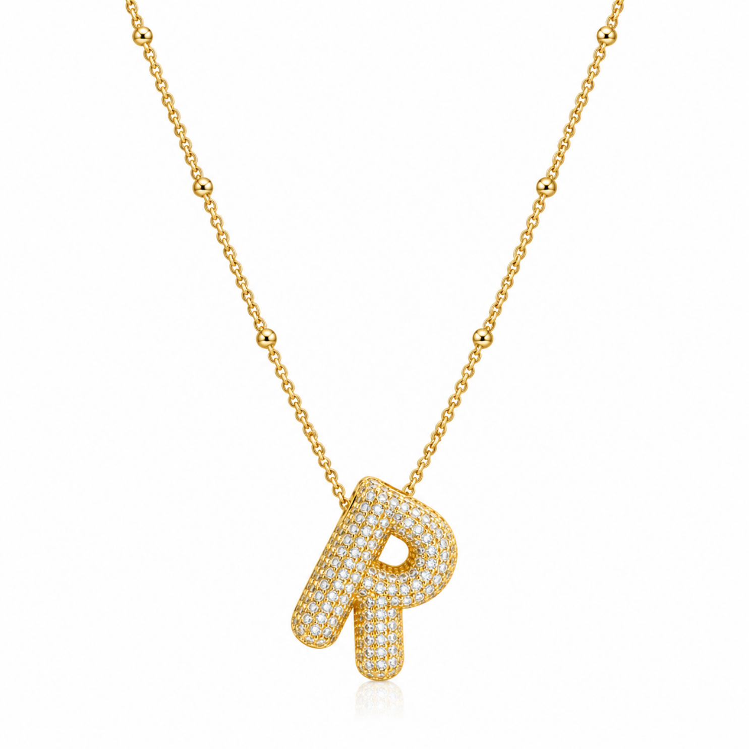 Yougorgeous 18K gold bubble letter R necklace with crystal pavé on white background Yougorgeous 18K gold bubble letter R necklace with crystal pavé on white background