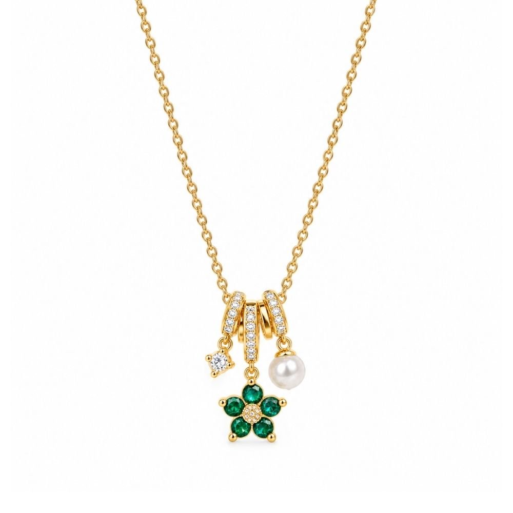 12 Yougorgeous 18K gold plated emerald flower, clear crystal, and pearl multi-charm pendant necklace